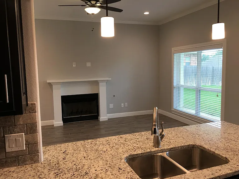 Kitchen View to Open Concept Den/Living Area