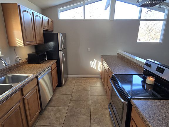 Well appointed kitchen with tons of counter space and natural light
