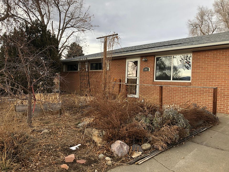 Front of home, cherry tree and herb garden.