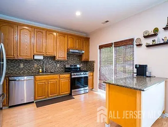 704 Dahlia Cir — Photo 10