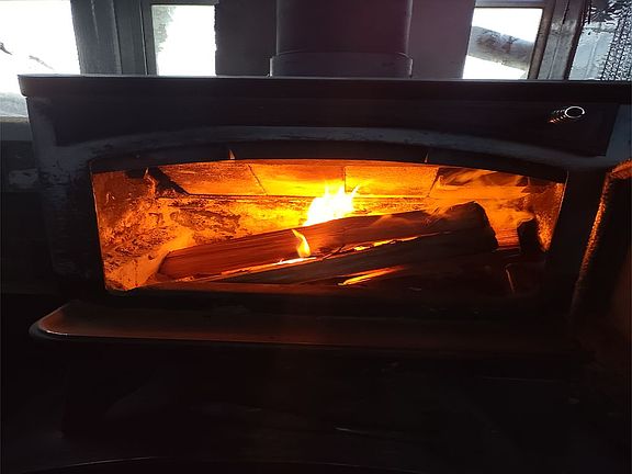 Wood stove in front bus