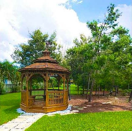 Exterior Front. Park like setting