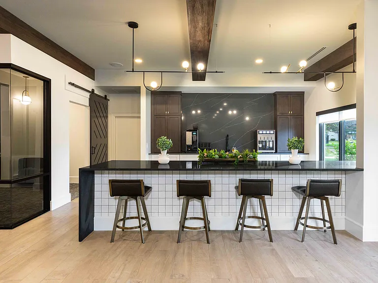 Resident lounge with community kitchen and gourmet coffee bar