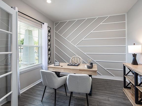 The versatile den makes a great home office space and you can choose to add french doors for additio