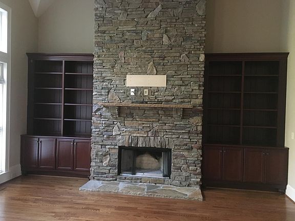 Beautiful 2 story stone fireplace in family room
