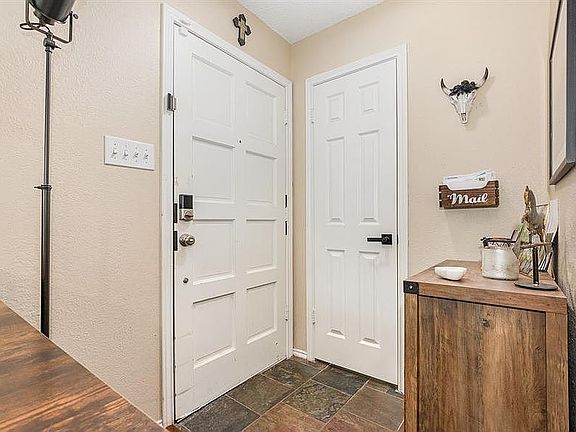 Front door and half-bath