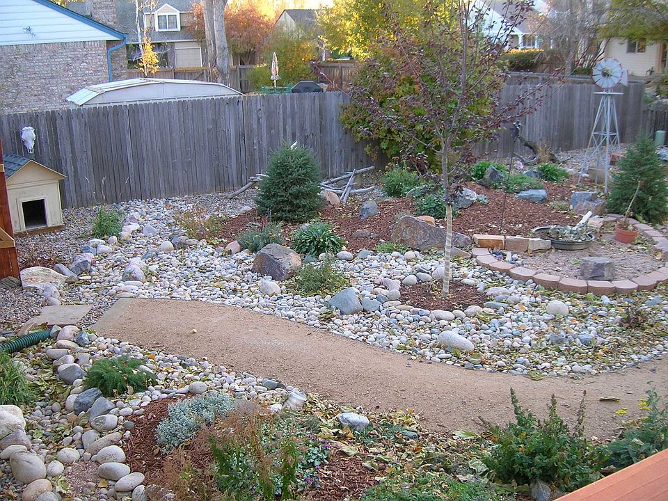 Native, low water plants highlight this xeric re-landscaping