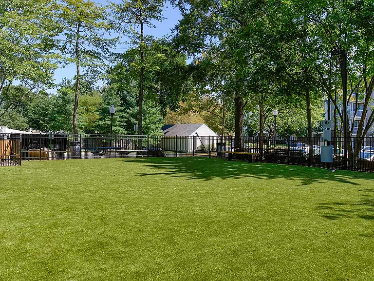 Bench seating and waste stations located throughout your dog park
