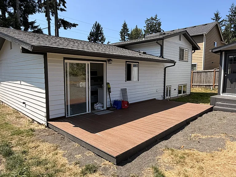 Rear of home including NEW deck