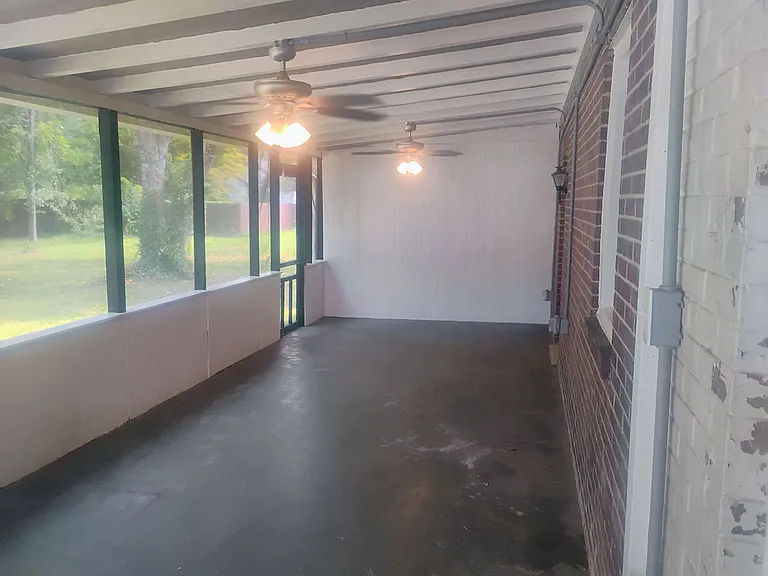 Large screened private back porch.