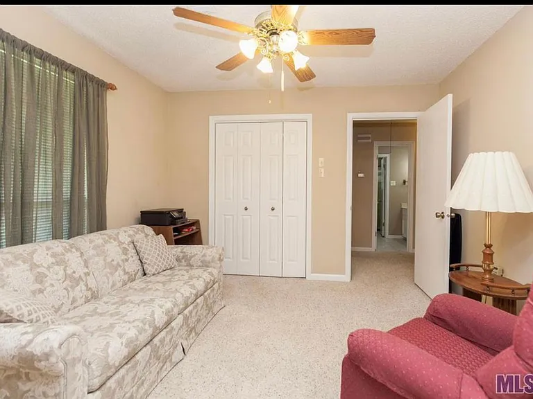 This room is currently storage for our garage sale and not suitable for pictures. This is
An old picture. The walls have been painted to match the living room.