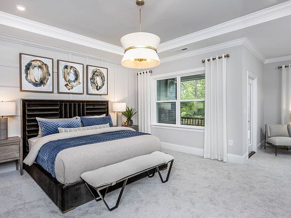 Owner s retreat with sitting room and covered deck