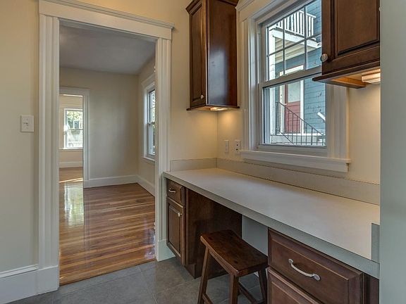 Built in desk/office nook between kitchen & dining room