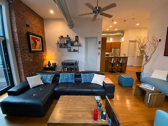 Living room with view open kitchen
