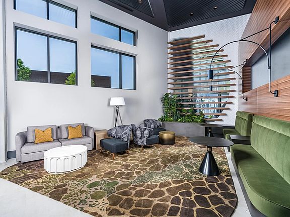 This lobby lounge offers bold design and inviting comfort, perfect for catching up, winding down, or simply enjoying the space.