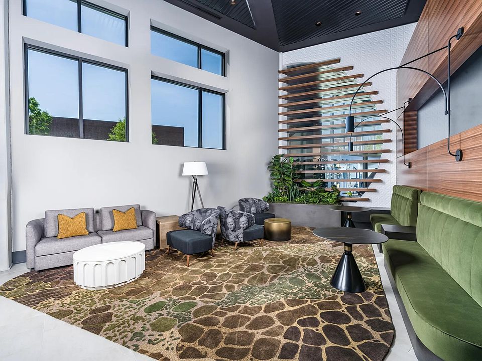 This lobby lounge offers bold design and inviting comfort, perfect for catching up, winding down, or simply enjoying the space.