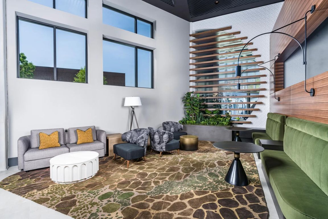 This lobby lounge offers bold design and inviting comfort, perfect for catching up, winding down, or simply enjoying the space.