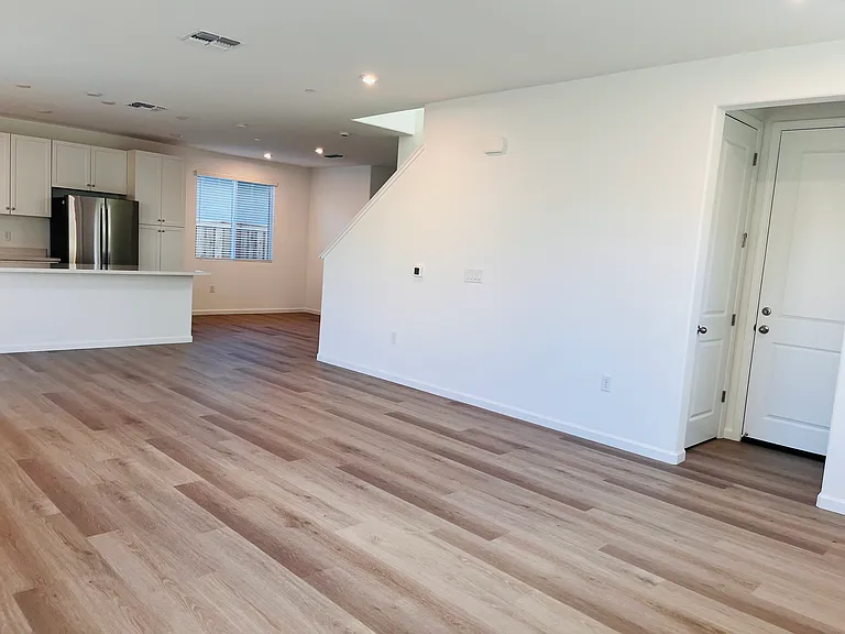 Great room and garage access door