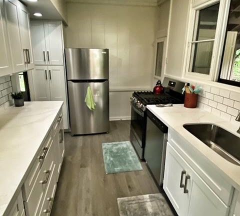 Renovated kitchen with newer applicances and gas range