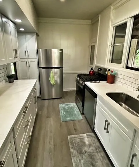 Renovated kitchen with newer applicances and gas range