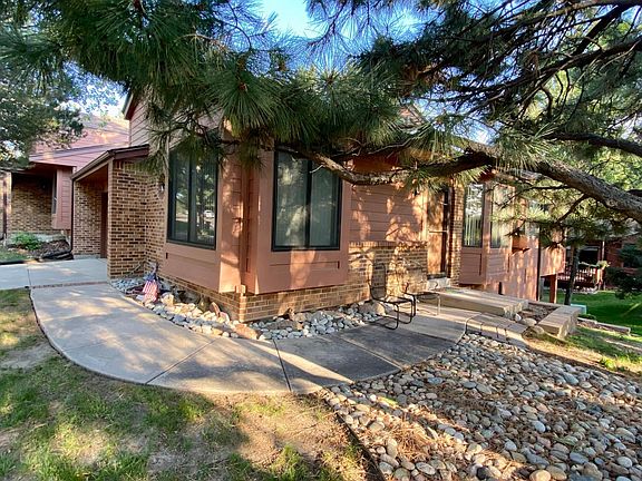 Front door. Lounge chairs.