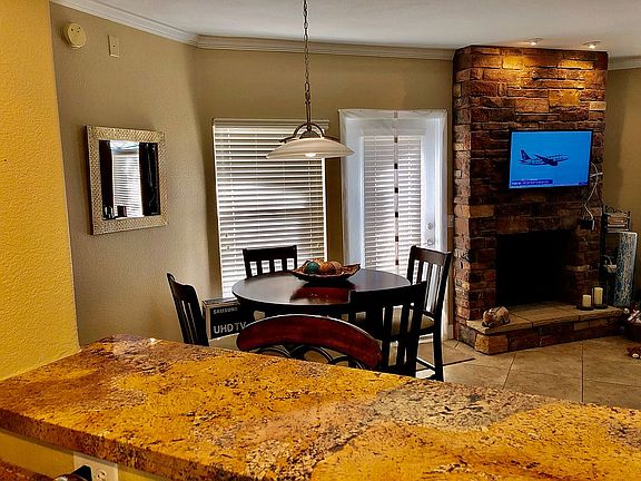 Dining table, fireplace, pat