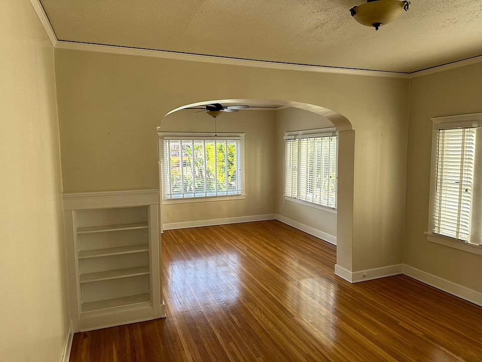 View of living room through dining room from front door.