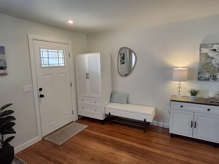Welcoming entrance with coat closet and shoe storage