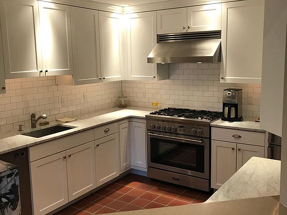 Designer Kitchen with High End Stainless Appliances