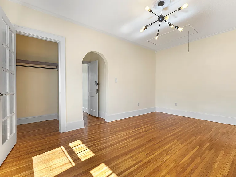 bedroom/ living room towards entrance/ closet