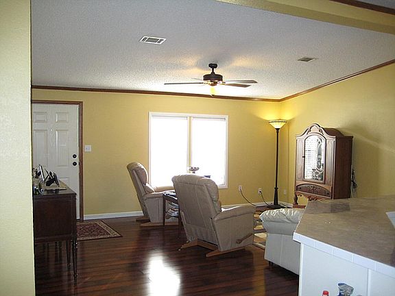 SPACIOUS LIVING ROOM OPEN TO KITCHEN WITH HIGH CEILINGS, BEAUTIFUL NEW 5" WOOD FLOORS & FRESH PAINT!