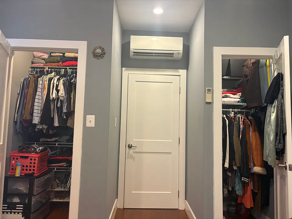 Bedroom closets open.