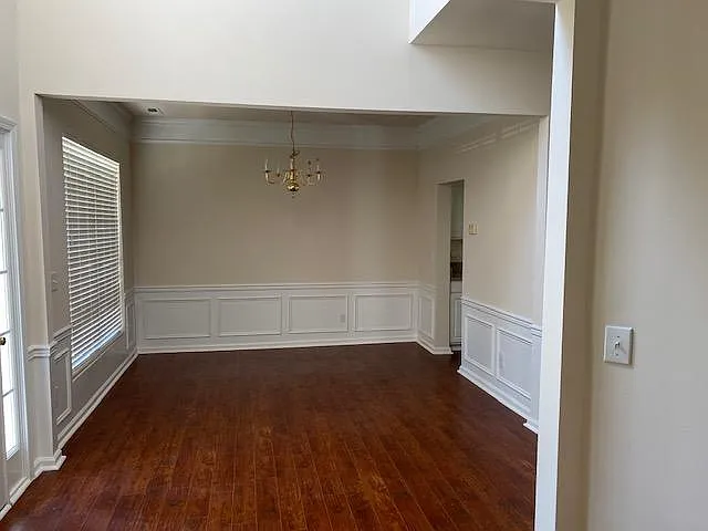 Formal Dining room has crown molding and shadow boxes and chair molding