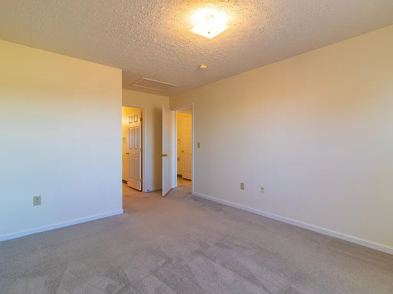 Master Bedroom with attached bath and walk in closet