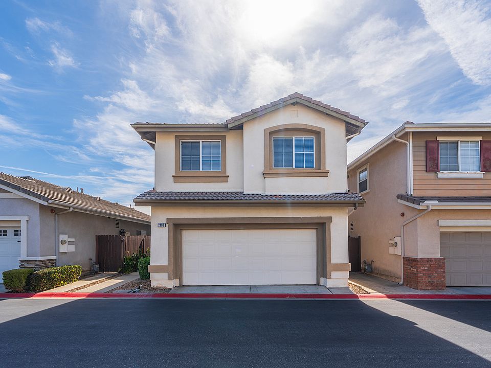 Front exterior - attached garage.