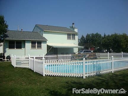 Back Yard
						:
						Fully fenced, 18 x 36 in-ground heated pool, large composite deck
