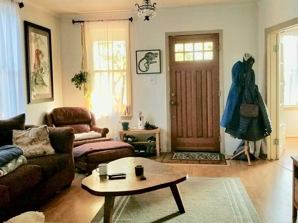 Living Room with Sun room through French doors, Hard wood floors