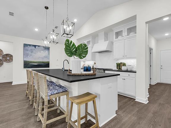 Kitchen with quartz island and countertops