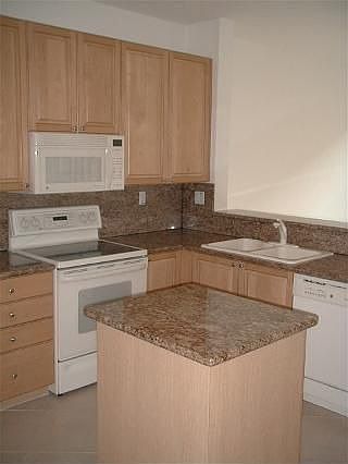 Kitchen with updated granite tops