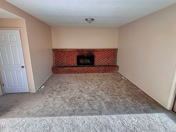 Family room with wood burning fire place