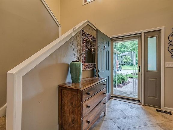 Open and airy beautiful foyer. Home has cathedral ceilings throughout.