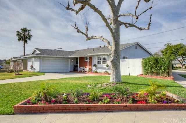 Inviting home on a large corner lot with RV parking