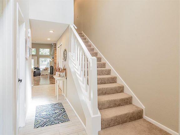 Straight ahead is the updated kitchen and gorgeous family room.