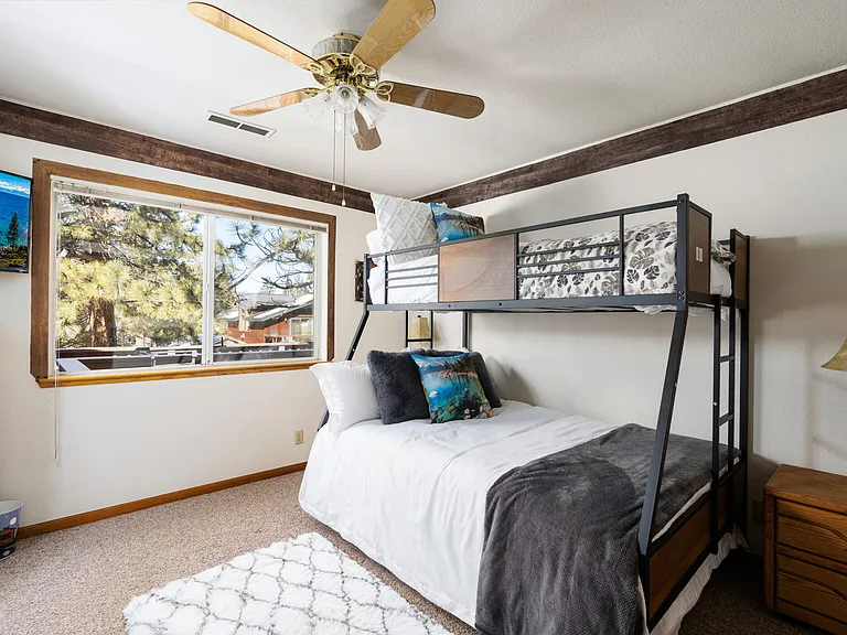 Upstairs guest room with TRIPLE bunk bed. Twin top, Full bed bottom, and bottom roll out Twin bed.