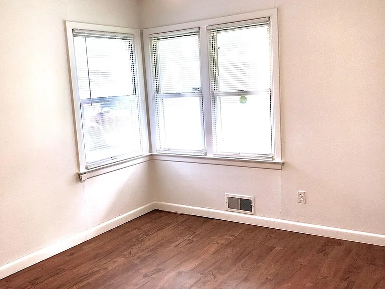 Bedroom #1 with window blinds. Fits a Queen bed. New modern ceiling fan with LED light with dimmer and variable speed fan.