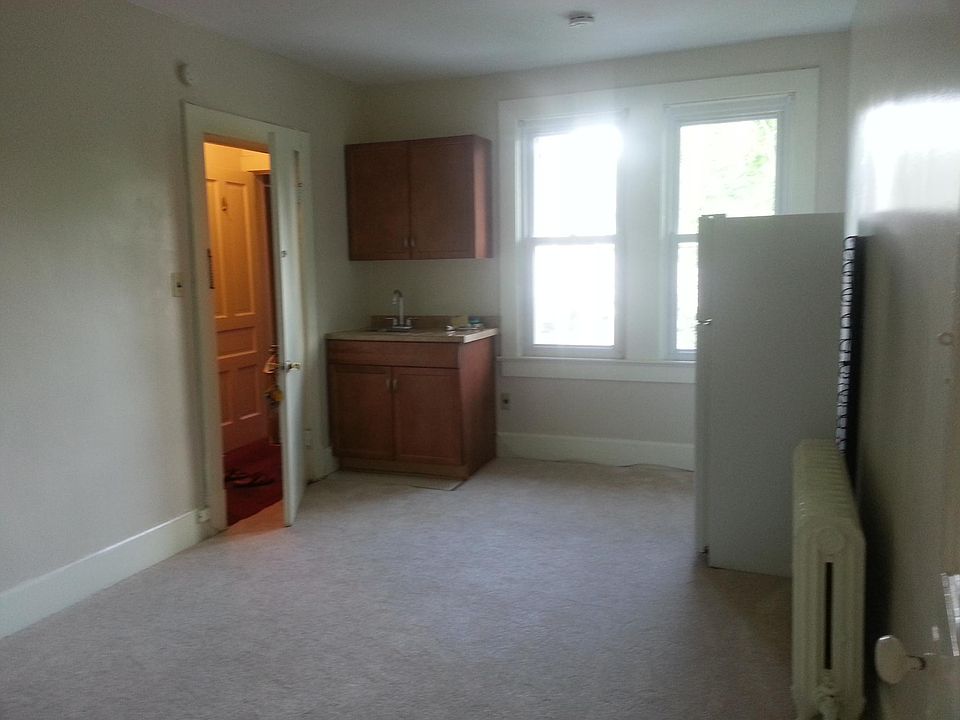 View of hall Entrance and front room from bedroom