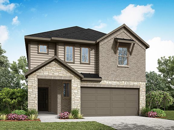 A two-story residential house with a garage, surrounded by lush greenery and a clear blue sky with f