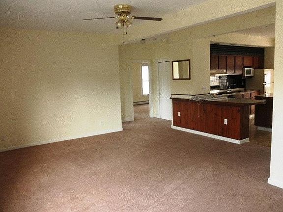 Living room looking into kitchen
