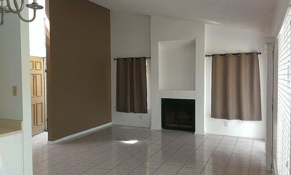 Living Room with fireplace and vaulted ceiling