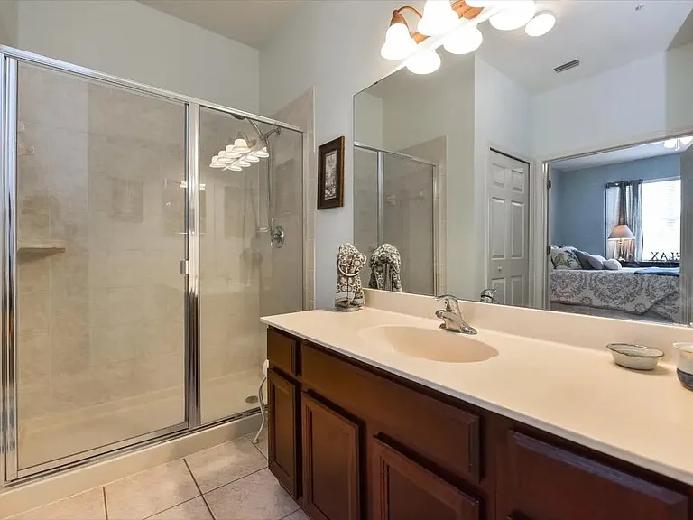 master bathroom before renovation of shower to show counters and layout